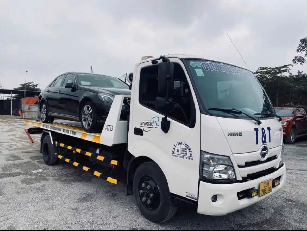 Vận chuyển ô tô đi check xe